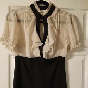 Women's frilly feminine blouse with high collar